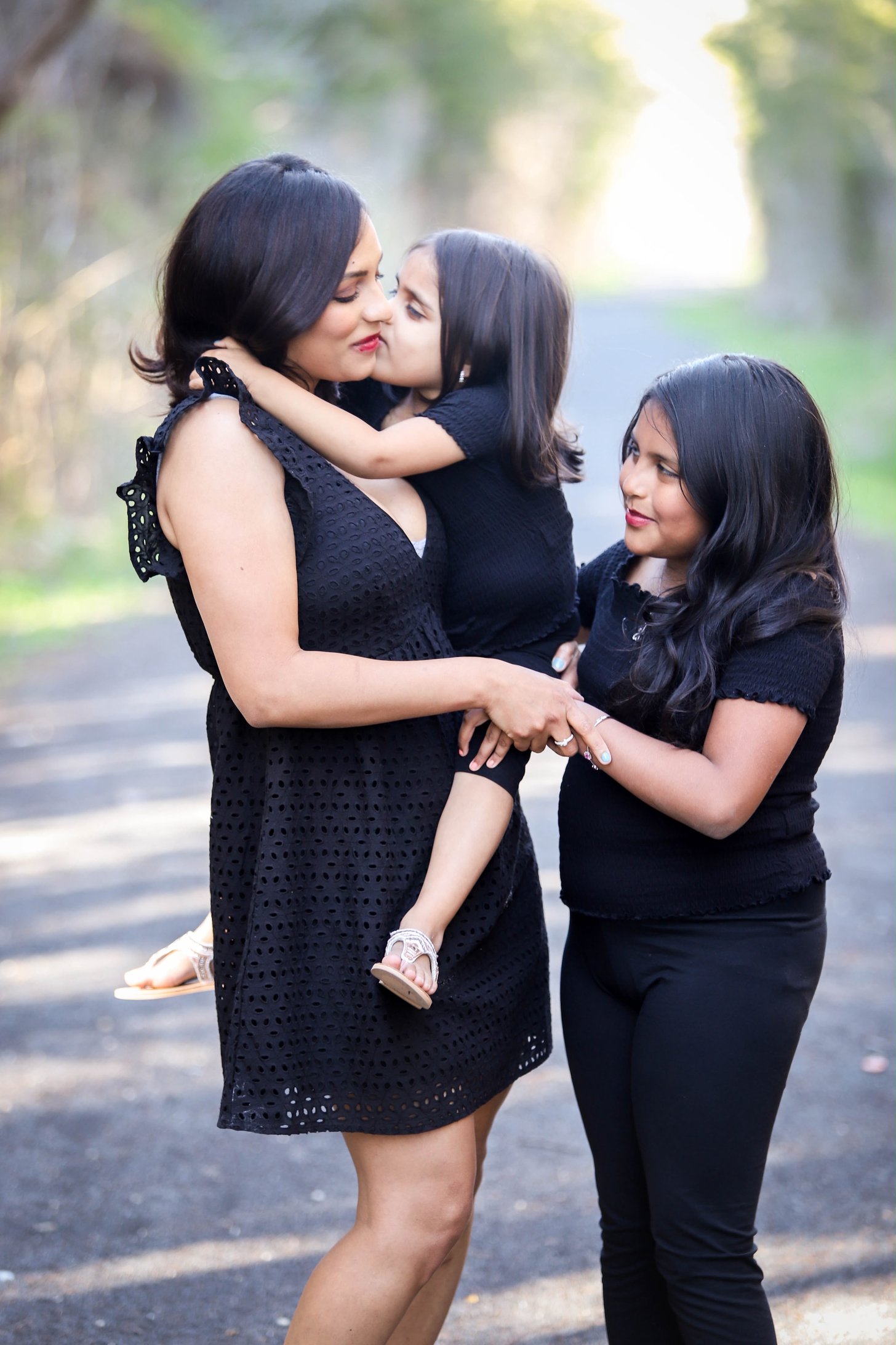 A mom with her two young daughters